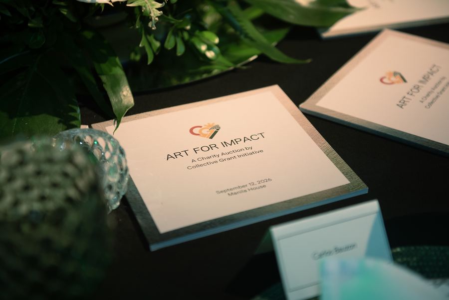 The Art for Impact catalogue at a place setting