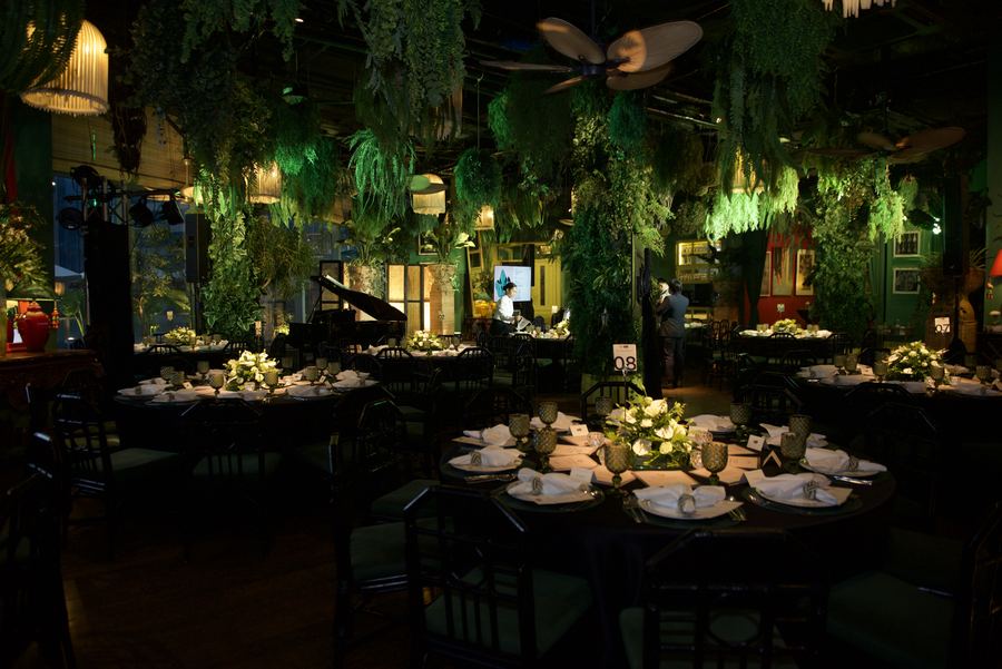 The dining room at Manila House set for dinner